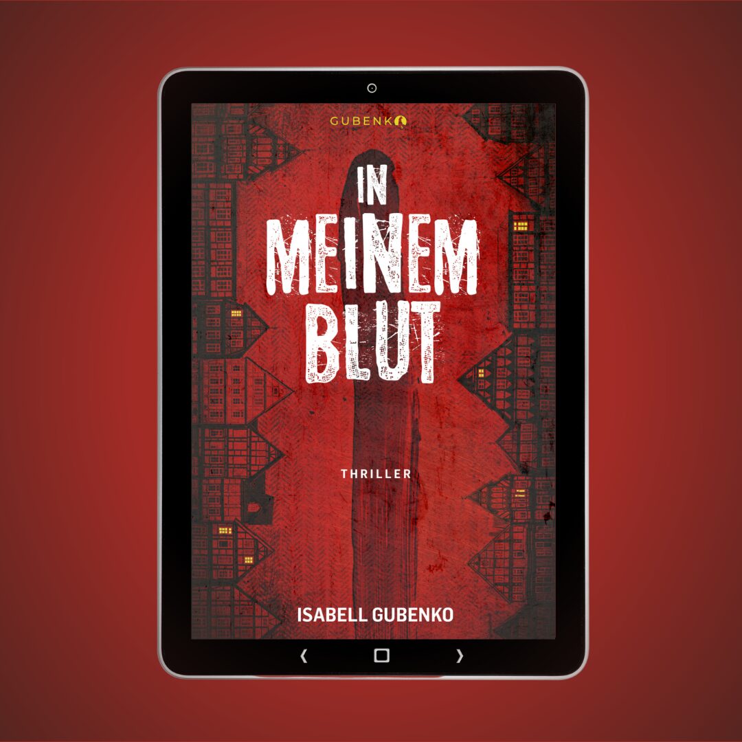 Das Bild zeigt das Cover eines Buches auf einem Tablet. Der Hintergrund ist rot mit einem dunklen, geometrischen Muster an den Seiten. In der Mitte steht in großen, weißen Buchstaben der Titel "IN MEINEM BLUT". Darunter, in kleineren weißen Buchstaben, steht "THRILLER". Am unteren Rand des Covers steht der Name der Autorin "ISABELL GUBENKO". Oben auf dem Cover ist der Nachname "GUBENKO" in gelber Schrift zu sehen.