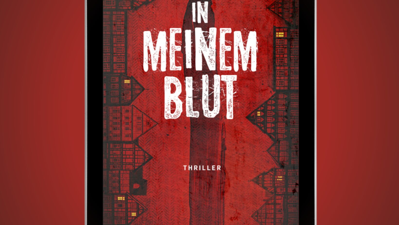 Das Bild zeigt das Cover eines Buches auf einem Tablet. Der Hintergrund ist rot mit einem dunklen, geometrischen Muster an den Seiten. In der Mitte steht in großen, weißen Buchstaben der Titel "IN MEINEM BLUT". Darunter, in kleineren weißen Buchstaben, steht "THRILLER". Am unteren Rand des Covers steht der Name der Autorin "ISABELL GUBENKO". Oben auf dem Cover ist der Nachname "GUBENKO" in gelber Schrift zu sehen.